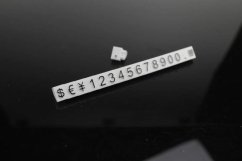 Plastové cenovky černé, bílé 6x9mm 20x řada €,$,¥ (ESS-WB)